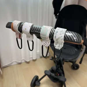 Ganchos para cochecito de cuero PU 4 piezas, colgador de bolso estampado para carrito bebé.