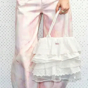 Korean style solid color ruffled canvas tote bag, large capacity casual shoulder handbag.