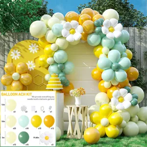 Detail shot of party balloon arch kit featuring green, yellow and white daisy foil balloons.