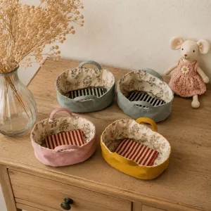 Miniature fabric sleeping basket for 10cm plush dolls, cute cradle bed, handmade toy accessory.