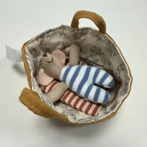 Miniature fabric mouse doll toy in a cute little basket, detailed dollhouse accessory.