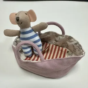Miniature fabric mouse toy in pink cradle crib dollhouse accessory for children gift detail view