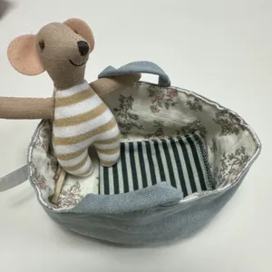 Miniature dollhouse cradle basket with cute fabric toy mouse accessory for children gift detail view