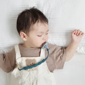 Silicone baby pacifier clip chain detail view, safe soothing pacifier holder for infants.