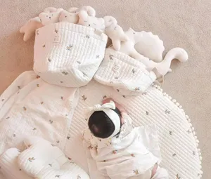 Korean style quilted baby storage bucket and round mat set with cute bear embroidery details.