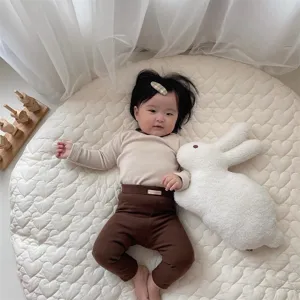 Cute long-ear plush rabbit doll, soft fluffy comforting toy for baby sleeping and nursery decor.