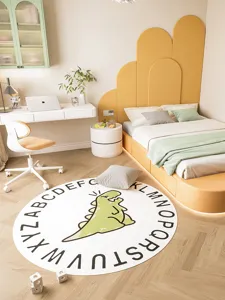 Round faux cashmere kids room rug with cute cartoon dinosaur and alphabet print details.