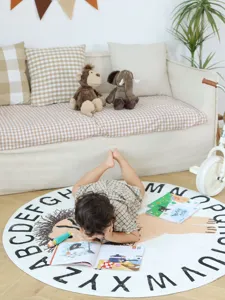 Round imitation cashmere kids room floor mat with cute alphabet and hedgehog print.