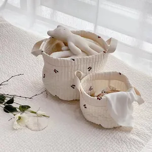 Korean style quilted cotton storage basket with cute bear embroidery for home organization.