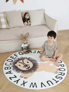 Round kids room carpet featuring cute cartoon lion print and alphabet border for nursery decor.