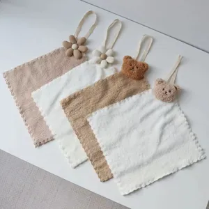 Cute hanging hand towel with plush bear decor, soft absorbent fabric for kitchen bathroom.