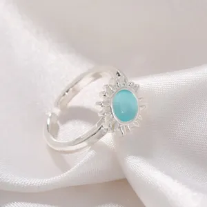 Sun cat's eye open ring detail, silver metal with blue stone, vintage trendy jewelry.