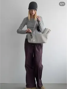 Minimalist grey tote bag in daily casual outfit scene, showing large capacity and handles.