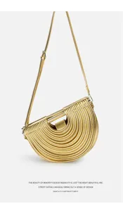 Gold metallic pleated semi-circular shoulder bag detail, unique niche designer handbag.
