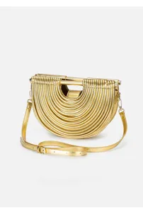 Close-up detail of the gold pleated semi-circular handbag featuring unique curved noodle design.