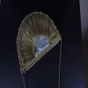 Gold metal fan shaped crescent evening clutch bag with chain strap and inner pocket detail.