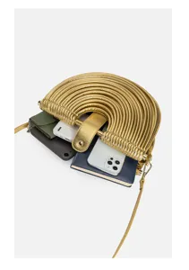 Gold metallic semi-circular crossbody bag interior detail showing daily storage capacity.