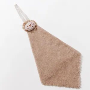Detailed view of the cute hanging hand towel with plush animal decoration and absorbent fabric.
