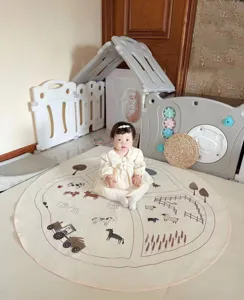 Detailed shot of Nordic baby crawling mat with cute farm animal print in a cozy kids room setup.