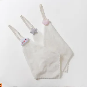 White hanging hand towel set with cute plush decoration for kitchen and bathroom use.