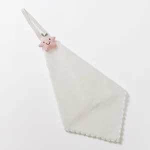 Close up of a cute white hanging hand towel with a pink star decor, soft absorbent fabric.