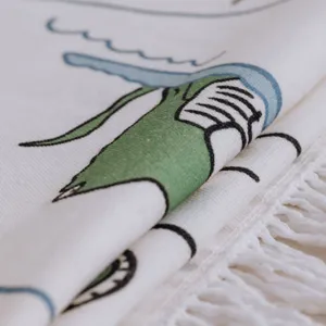 Children's room crawling mat detail, Nordic style printed rug with fringe edge, soft textile.