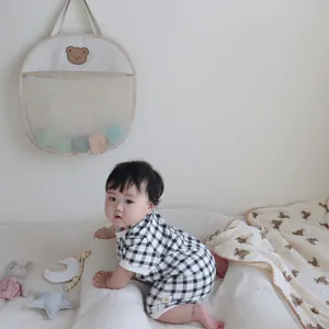 Cute bear mesh hanging storage bag for baby toys and bathroom organization, breathable net.