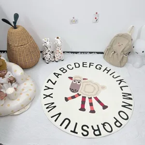 Details of the round nursery rug with alphabet letters and cute sheep design for kids room.