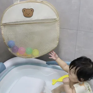 Baby bath storage net bag detail, cute bear design hanging organizer for bathroom toys.
