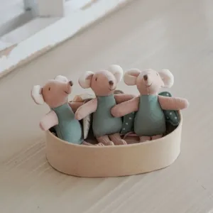 Miniature mouse doll set with angel wings in a round box, perfect for dollhouse play.
