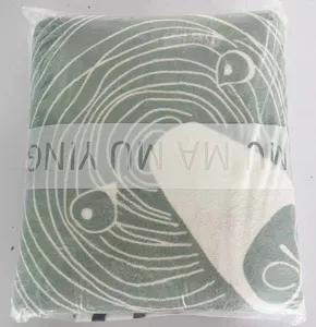 Green cartoon animal print plush rug detail view for kids room bedside floor mat.