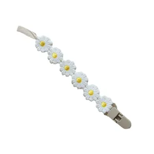 Cute floral baby pacifier clip with white daisy embroidery for infant teething and anti-loss.