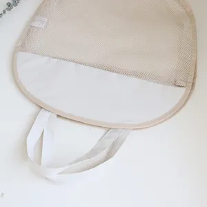 Mesh hanging storage bag for bathroom toys and baby bath essentials, breathable white net design.