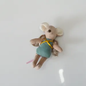 Detail shot of the 10cm miniature angel mouse plush toy showing its delicate wings and dress.