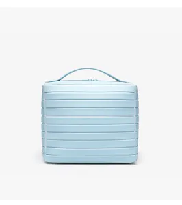 Light blue cosmetic storage bag with horizontal stripes portable design for daily use.