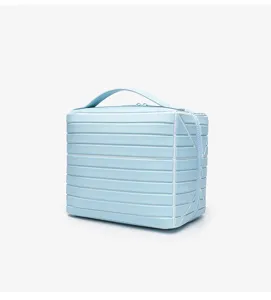 Light blue striped cosmetic bag portable travel makeup storage case for daily commuting.