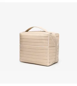 Beige striped cosmetic storage bag with zipper and handle, practical makeup organizer box.