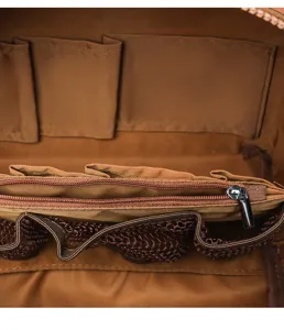 Brown travel cosmetic organizer bag interior detail showcasing multi-compartment mesh pockets zipper