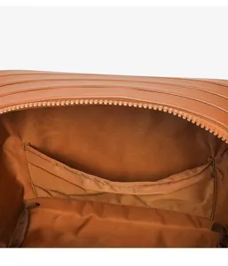 Detailed view of brown striped cosmetic bag interior, showing lining and pocket structure.