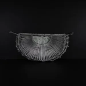 Handmade woven crescent bag for women, stylish semi-circular handbag with inner pocket and strap.