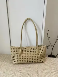 Retro woven shoulder bag for women, minimalist faux leather cutout tote bag for daily casual use.