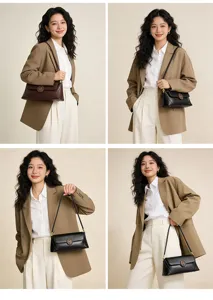 Chic leather shoulder bag for women, stylish underarm baguette bag with metallic deer logo.