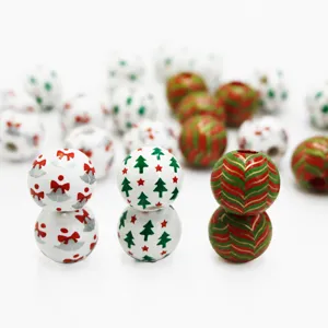Detailed shot of 16mm wooden beads with Christmas tree and bell patterns, ideal for DIY crafts.