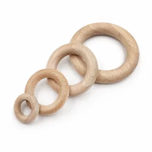 Natural beech wood rings 25-50mm assorted sizes, perfect for DIY jewelry and baby teether crafts.
