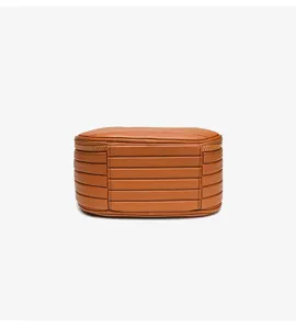 Brown leather travel cosmetic bag with elegant horizontal stripes and zipper closure design.