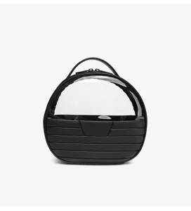 Black round cosmetic bag with clear top window and striped design detail for daily makeup.
