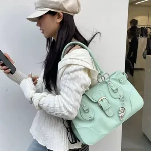 Korean style mint green motorcycle tote bag, fashionable large capacity commute shoulder handbag.