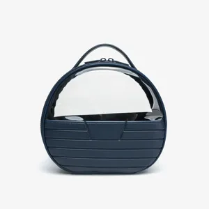 Round cosmetic bag for women, large capacity travel makeup organizer with clear window and handle.