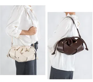 Women pleated shoulder bag detail view showing unique woven design and chic drawstring closure.