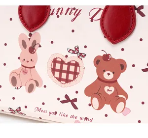 Cute cartoon bear bunny print handbag detail view featuring polka dots and sweet aesthetic.